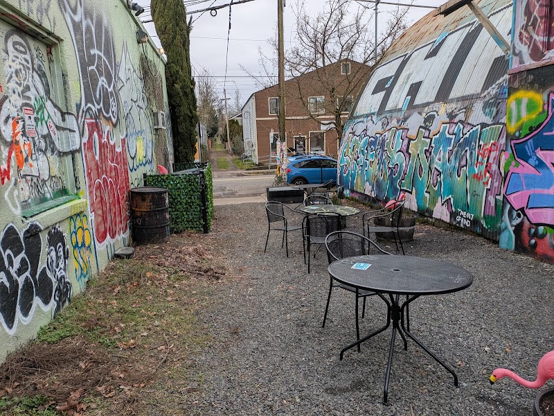 Outer Space (Legal Graffiti Mural Art Wall) and pedestrian Street Plaza