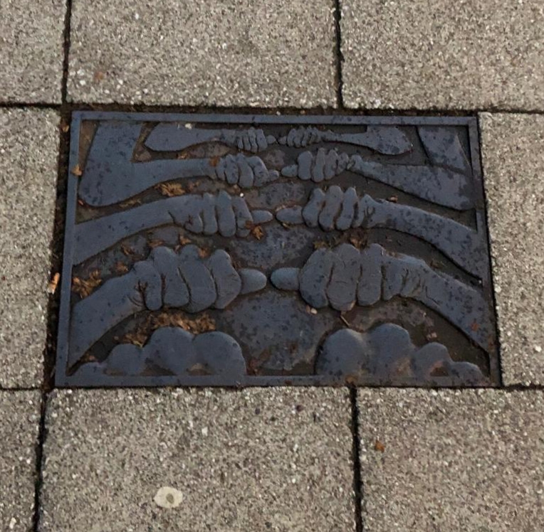 'Signing Hands' Cast Iron Slabs