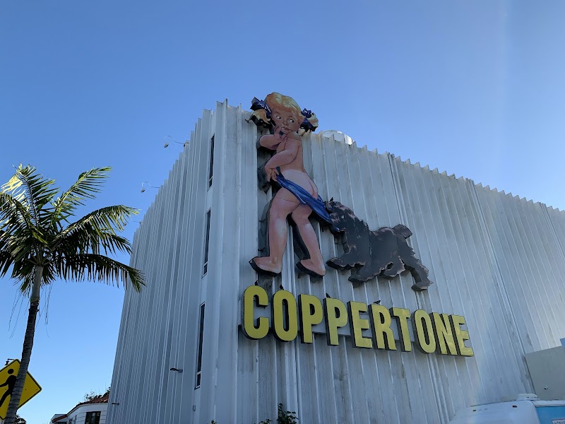 Coppertone Girl Sign