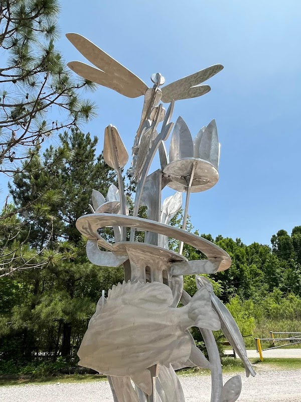 Eco-Friendly (dragonfly life-cycle sculpture), by David Sheldon
